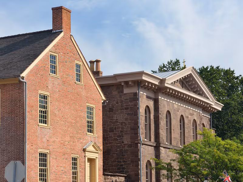 Cobblestone street and historic homes in New Castle, Delaware
